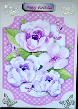 Beautiful Lilac Flowers in a Lattace Bracket  by Mary Murphy