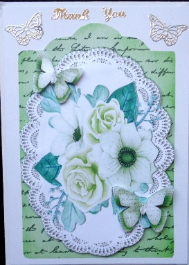 green painted roses and paper butterflies on script topper & lace by Mary Murphy