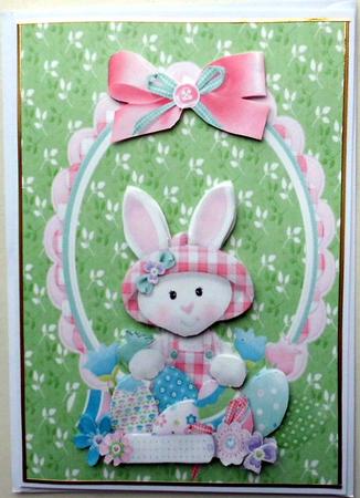 Bunny in Pink Oval Frame with Bow by Mary Murphy
