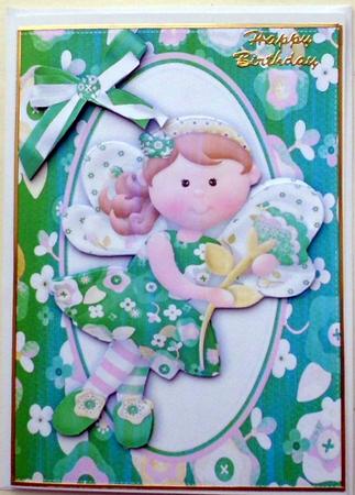 Pretty Fairie in Green with Bow by Mary Murphy