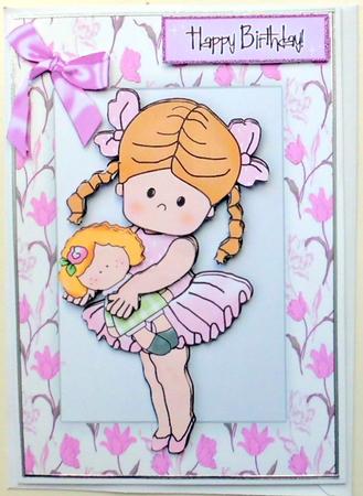 Little Ballerina with Her Doll in a Floral Frame by Mary Murphy