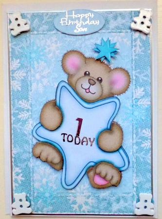 Cuddly Bear Holding a Blue Star by Mary Murphy