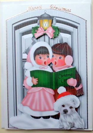 Cute Puppy with Carol Singers and Lantern by Mary Murphy