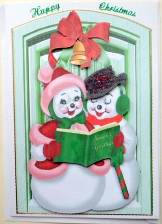 Mr and Mrs Snowman Carol Singing by Front Door by Mary Murphy