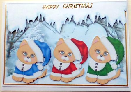 Three Cute Little Kitties in a Snow Scene by Mary Murphy