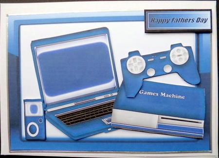 Laptop and Games Machine in Blue Glass Frame by Mary Murphy