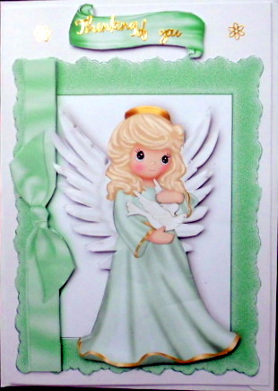 Pretty Angel in Green Holding a Dove in Frame with Bow by Mary Murphy