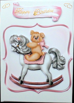 Cute Little Teddy on a Pink Rocking Horse by Mary Murphy