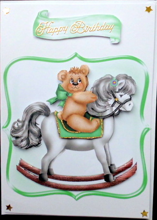 Cute Little Teddy on a Green Rocking Horse by Mary Murphy