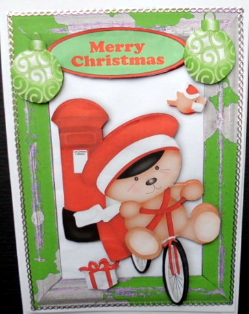 Christmas Teddy on Bike with Postbox by Mary Murphy