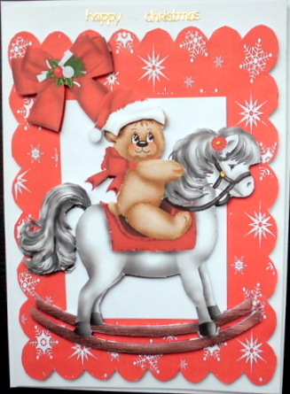Teddy with Santa Hat on Rocking Horse in Star Frame by Mary Murphy