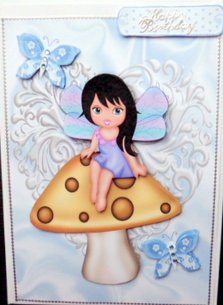 Sweet Faerie Sitting on a Mushroom by Mary Murphy
