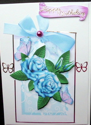 Blue Roses and Lilac Butterflies on a Floral Tag by Mary Murphy