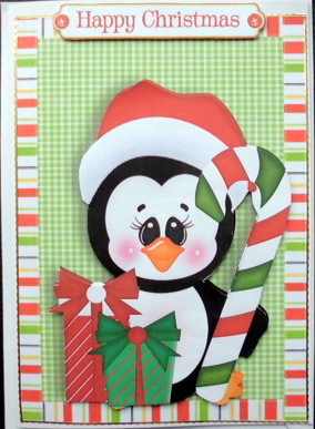 Cute Christmas Penguin with Presents & Candy Cane by Mary Murphy