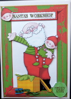 Lovely Santa with Elf in His Workshop by Mary Murphy