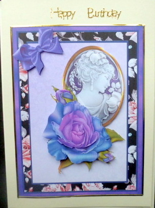 Cameo with Blue Roses by Mary Murphy