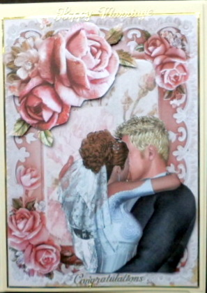 Frame of Pink Roses with Kissing Wedding Couple by Mary Murphy