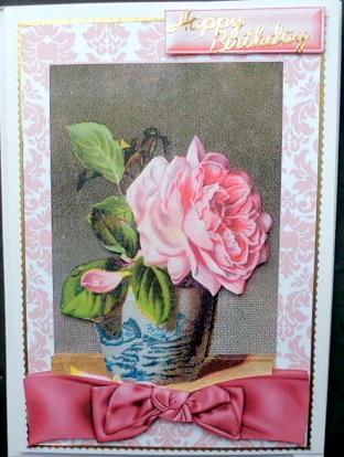 Pink Rose in a Vase with Bow by Mary Murphy