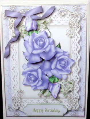 Lovely Lilac Roses on Babys Breath by Mary Murphy