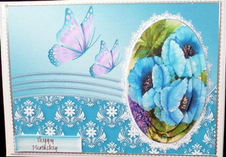 Pretty Blue Flowers with Butterflies Oval Pyramids by Mary Murphy