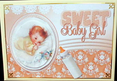 Sweet Baby Girl in Peach/lemon Oval Pyramids by Mary Murphy