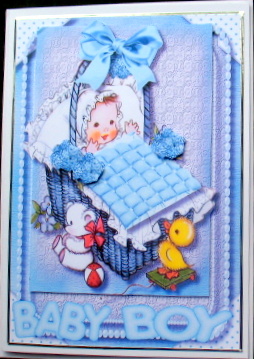 A Beauiful Baby Boy in a Basket  by Mary Murphy