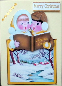 Carol Singers with Snow Scene of a Church in Gold Frame by Mary Murphy