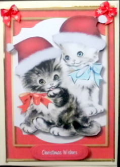 Two Adorable Kitties in There Santa Hats by Mary Murphy