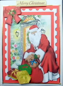 Santa Outside House with Lots of Presents by Mary Murphy