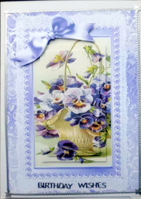 Purple Pansies in a Basket, with Lilac Bow, and Lace Pyramid by Mary Murphy