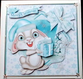 Christmas Bunny in Blue Square Card Front by Mary Murphy