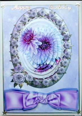 Pretty Lilac Flowers in Rose Frame with Bow Oval Pyramids by Mary Murphy