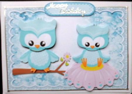 Cute Owls Sitting on a Branch and Flower by Mary Murphy