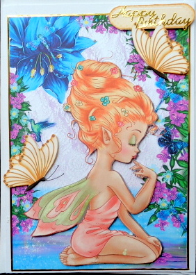 Pretty Faerie Sitting Down with Flowers and Butterflies by Mary Murphy