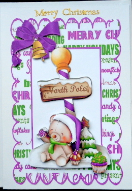 Teddy in Purple Santa Hat at the North Pole by Mary Murphy