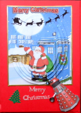 Santa in the Tardis in Snow Scene, Oval Pyramids by Mary Murphy