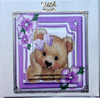 Cute Fuzzy Bear with Purple Flowers and Border Pyramids by Mary Murphy