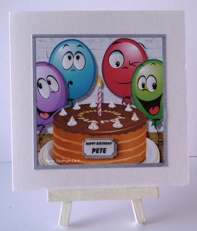 Birthday cake with funny balloons by Mary Thomsen