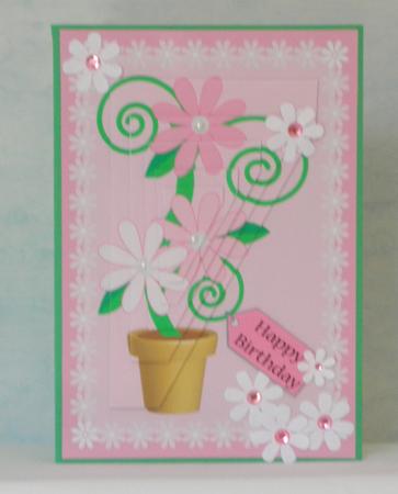 Flowers in Pot Pyramid – Pink Shades by Maurine Tapscott