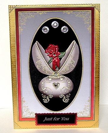 Beautiful Decorative Open Egg and Deep Red Rose by Maxine Jones