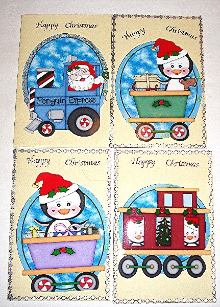 4 Christmas Penguin Toppers by Maxine Jones