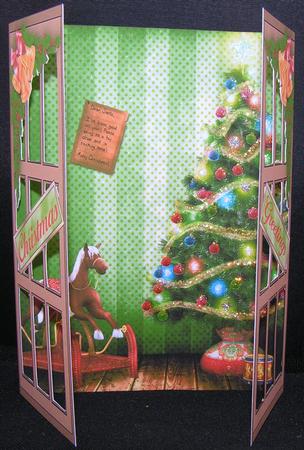 Through the Christmas Window a Rocking Horse & a Drum by Melanie Brewin