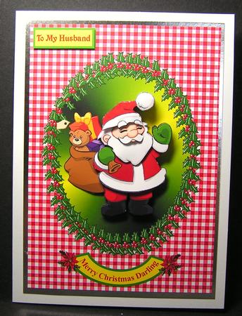 Father Christmas in Holly Oval by Melanie Brewin
