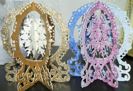 Snowflake snowglobe decorations by MELLONIE-DAWN ADAMS