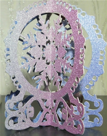 Snowflake snowglobe decorations by MELLONIE-DAWN ADAMS