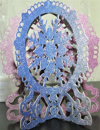 Snowflake snowglobe decorations by MELLONIE-DAWN ADAMS