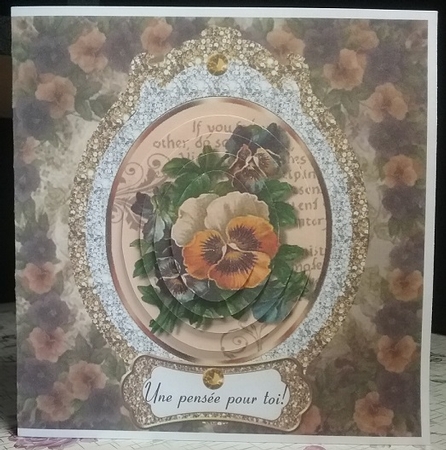 Pretty vintage topper in glitter with pansies on script pyramids by Misha Saillant