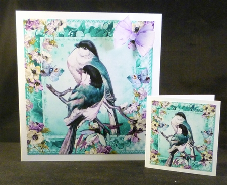 Pretty blue birds on a branch with flowers 8x8 by Michelle Chivers