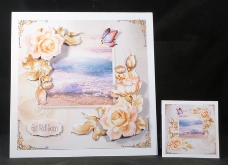 Lit Pink Roses with an Ocean Scene by Michelle Chivers