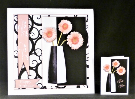 Pink Flowers in a Black and White Vase by Michelle Chivers